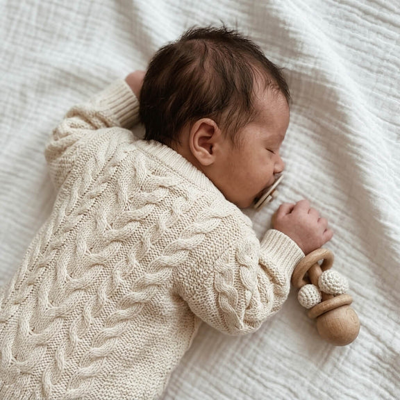 Baby Bloom Wooden Teething Rattle – handcrafted natural wood teether by Cuddle Bloom Pakistan